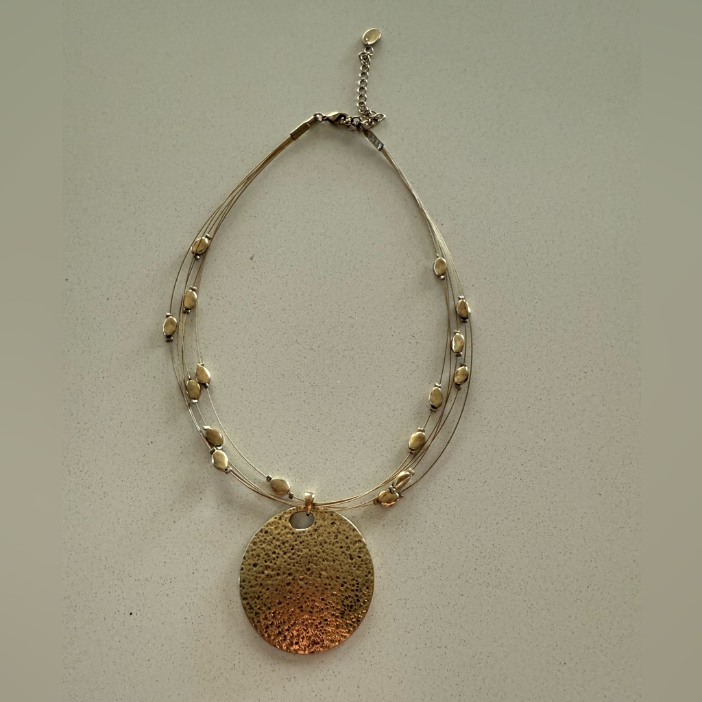 Bohemian Gold Statement Necklace With Textured Pendants